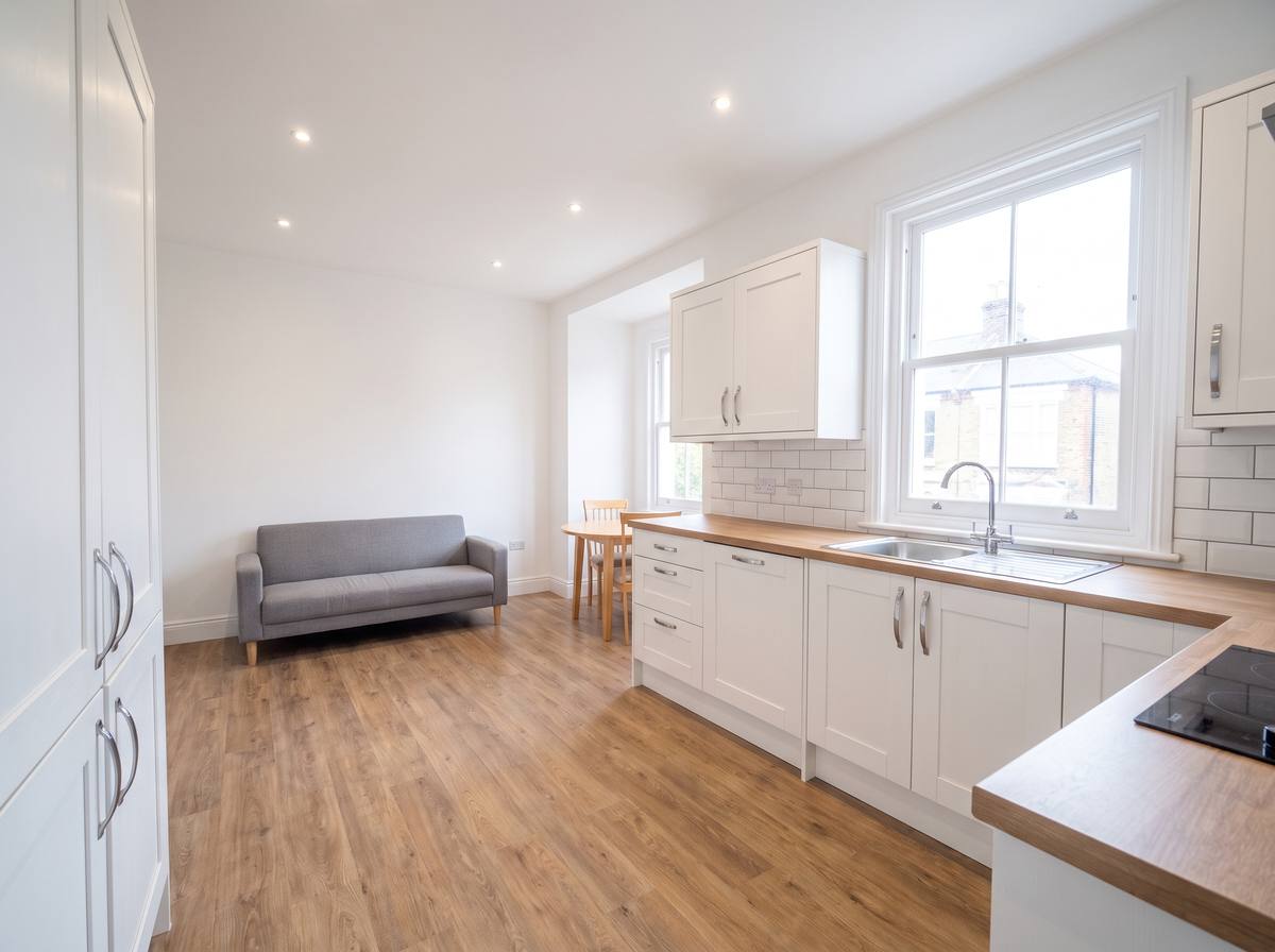 A refurbished rental flat ready to let, with a new kitchen and flooring